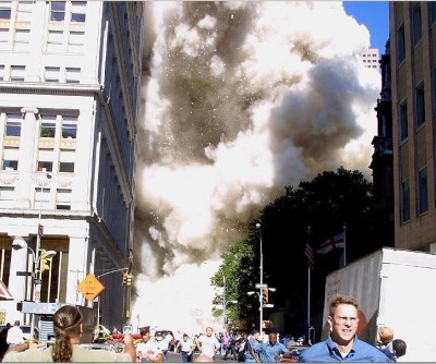 wtc_demolition_part__people_running_away_from_the_pulverized_particles_cloud.._400